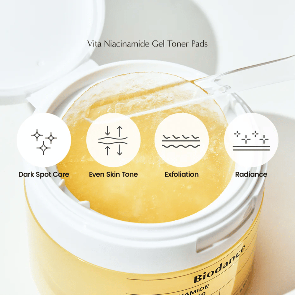 Biodance Vita Niacinamide Gel Toner Pads – almohadillas exfoliantes para un tono de piel más uniforme, brillo y tratamiento de manchas oscuras, mostradas en un frasco abierto con pinzas.